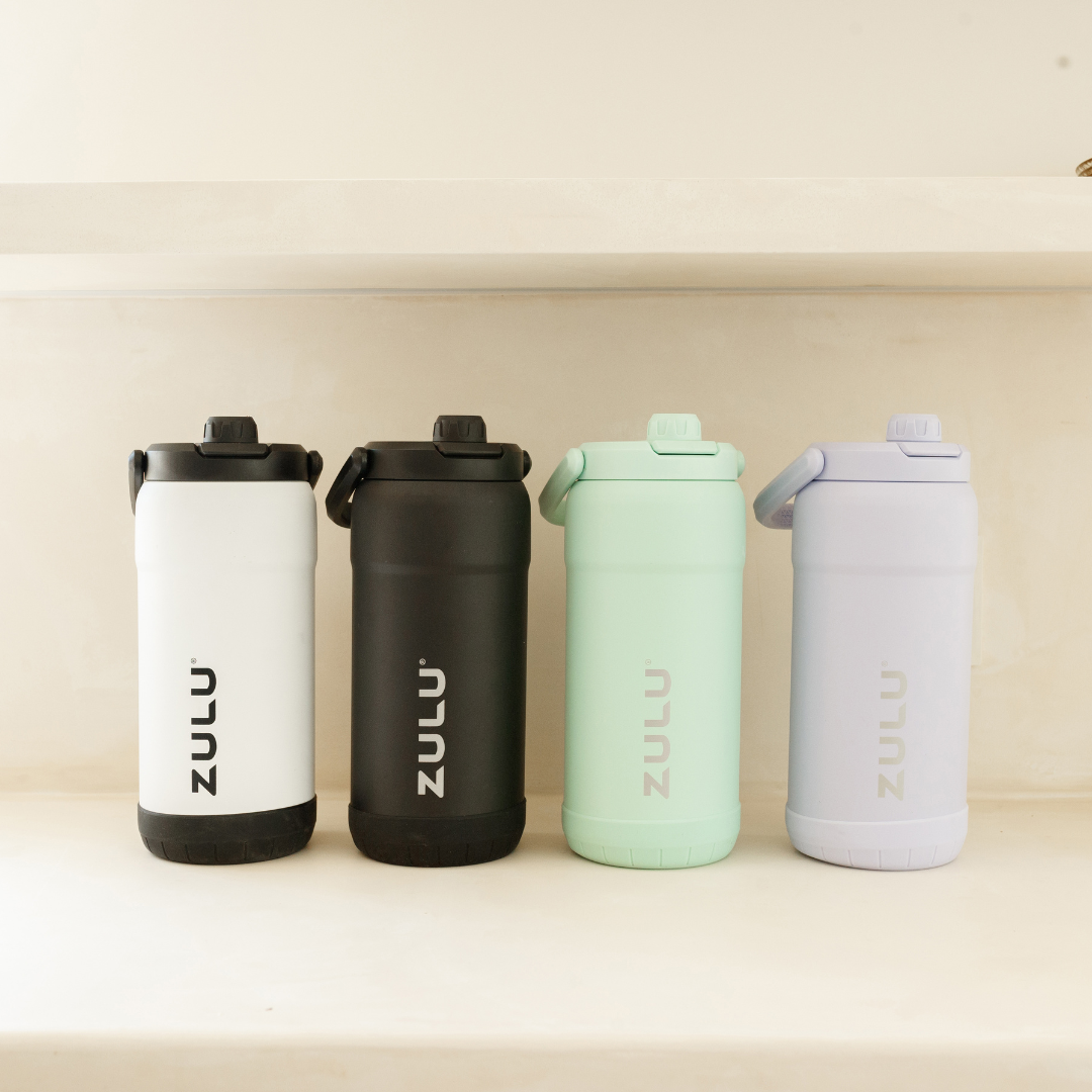 goals-mammoth-101oz-stainless-steel-bottle-u0 GoalsMammothAllColorsLifestyle.png